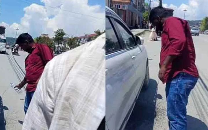 রাস্তায় পানের পিক ফেলায় ভারতীয় পর্যটককে দিয়ে পরিষ্কার করালেন নেপালি নাগরিক