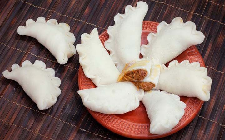 শীতের আমেজে পুলি পিঠার উৎসব